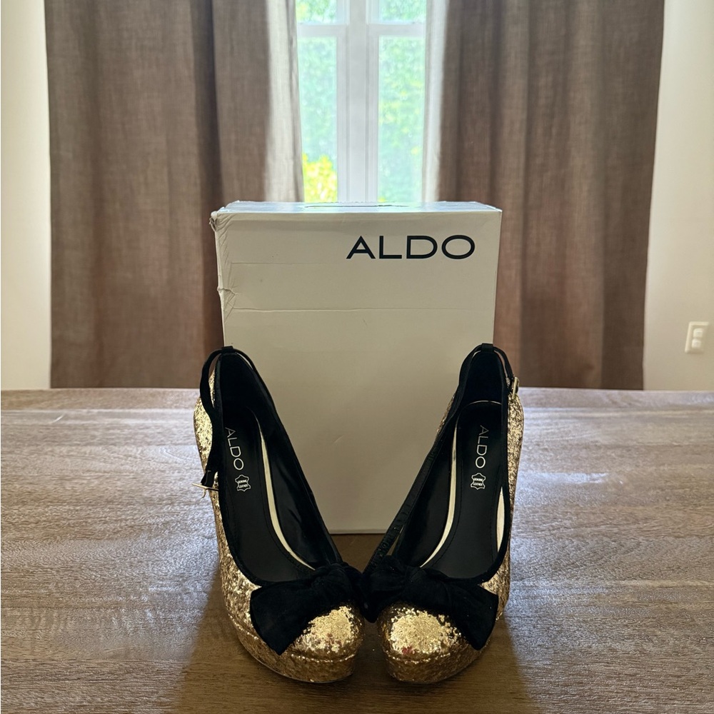 Aldo Black and Gold Stiletto Heels with Metallic Toe